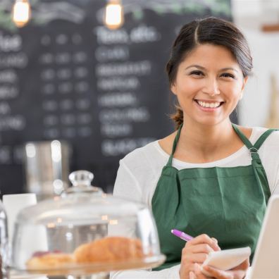 Person at counter in cafe