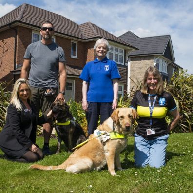 Redrow sales consultant Louise Azimi with the Okehampton & District Guide Dogs Fundraising group (Ri