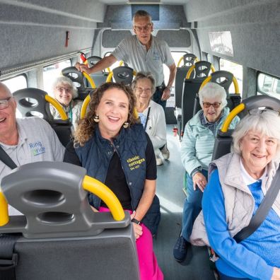 Pictured are Nicola Williams from Classic Cottages (centre) with Jack Aust, left, and Bob Classen from Ring and Ride, and service users (l-r) Norma, Rosemary, Jean and Marion. Image of ring and ride minibus passengers