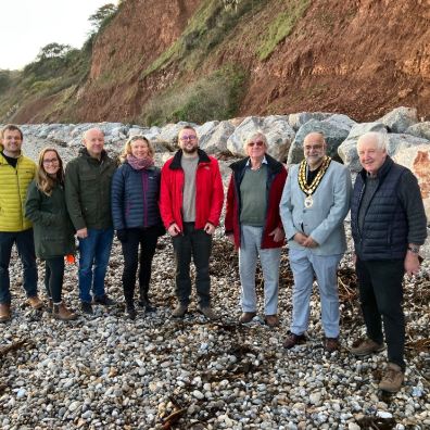 L-R: Tom Buxton-Smith (EDDC), Lamorna Taylor (South West Flood & Coastal), Henry Middleton (South West Flood and Coastal) Cllr Paula Fernley (EDDC Assistant Portfolio Holder for Environment - Operations), Cllr Dan Ledger (EDDC Ward Councillor for Seaton) , Philip Rees (Chair of SW Regional Flood and Coastal Committee) Cllr Amrik Singh (Mayor and Chairman of Seaton Town Council) , Cllr Geoff Jung (Portfolio Holder Environment – Operations). Image credit: Chrissy Lovebe.
