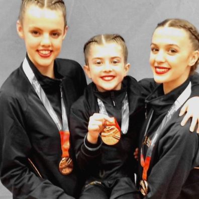 Three medals for Honiton gymnasts at national acrobatic finals