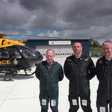 The police NPAS helicopter with (from left) Captain Ian Kingston and Tactical Flight Officers PC Rob Caught and PC Phil Knowles at the new airbase at Exeter Airport.