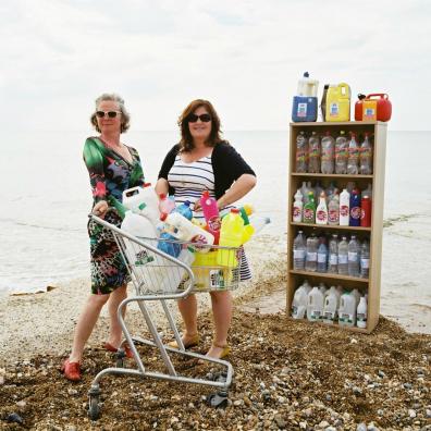 Artists Lou McCurdy and Chloe Hanks, with a small selection of the items set to appear in their 'supermarket'.