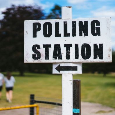 Polling station sign and direction arrow