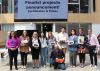 Group of young people holding prizes