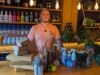 Owner of Aquarius Bar with some of the eco friendly products used