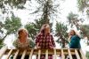 Three girls in a treehouse