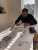 Artist Leo Jamelli at work on the Exeter Phoenix projection 