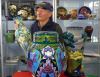 Auctioneer with examples of Moorcroft Pottery