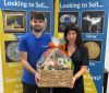 Barnaby Willis and Amelia Draper with Chilcotts prize hamper which can be won at the Honiton Show