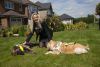  Redrow sales consultant Louise Azimi with guide dogs Fordy (L) and Winnie (R)