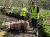 Volunteers installing Mycelium fruiting sacks 