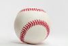A baseball on a white background